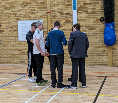 school; students taking part in a sport subject taster in the sports hall at RuTC